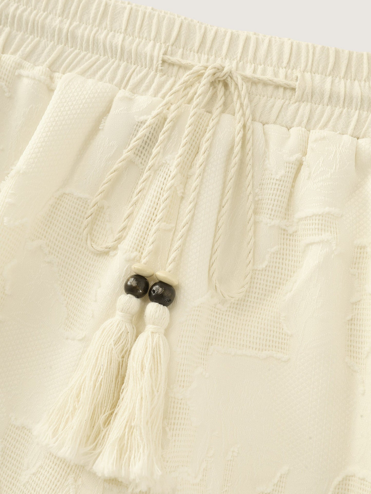Hollowed-Out Textured Drawstring Shorts