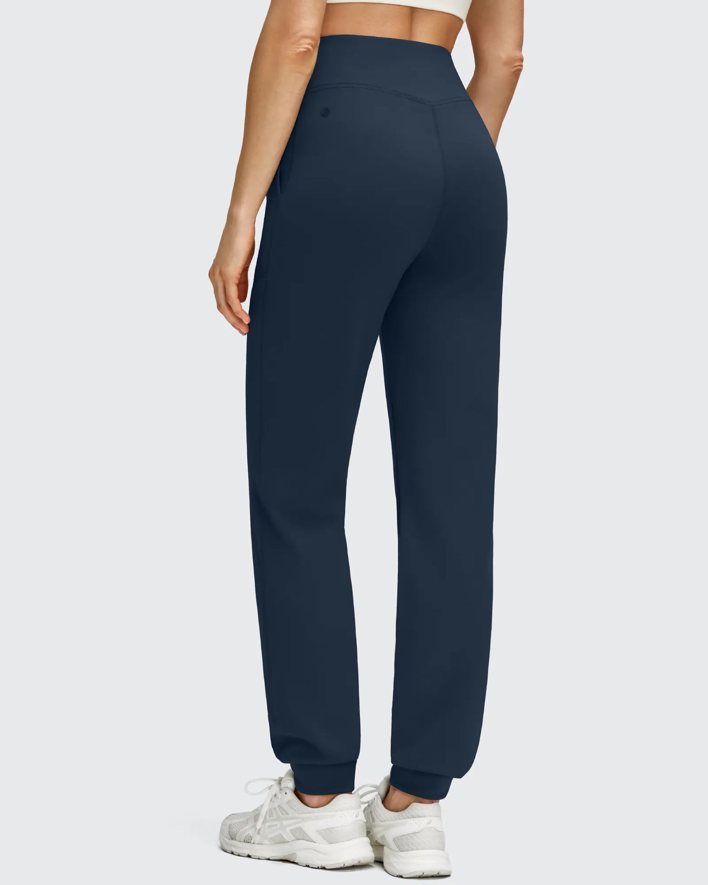 Pantalones deportivos de jogger con forro polar, puños elásticos y bolsillos