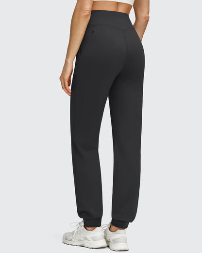Pantalones deportivos de jogger con forro polar, puños elásticos y bolsillos