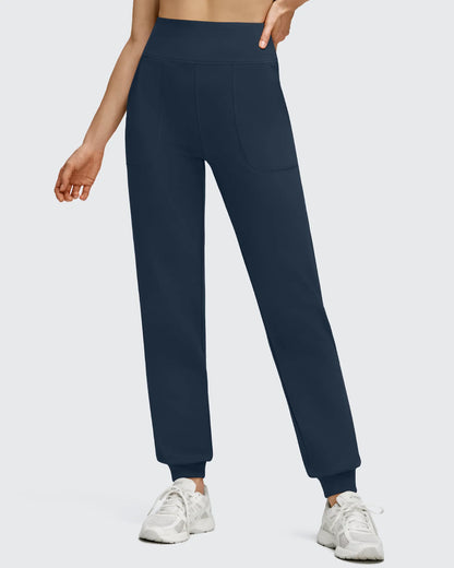 Pantalones deportivos de jogger con forro polar, puños elásticos y bolsillos