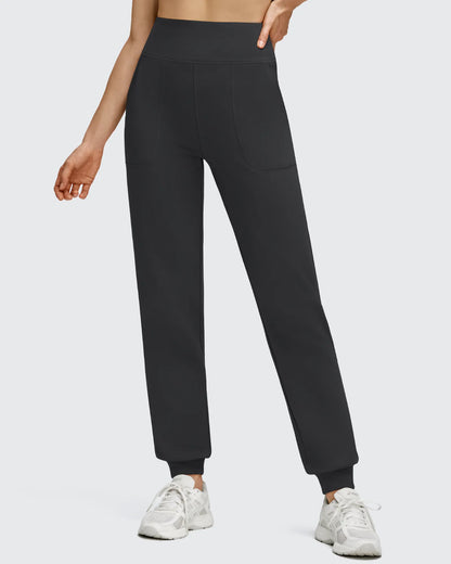 Pantalones deportivos de jogger con forro polar, puños elásticos y bolsillos