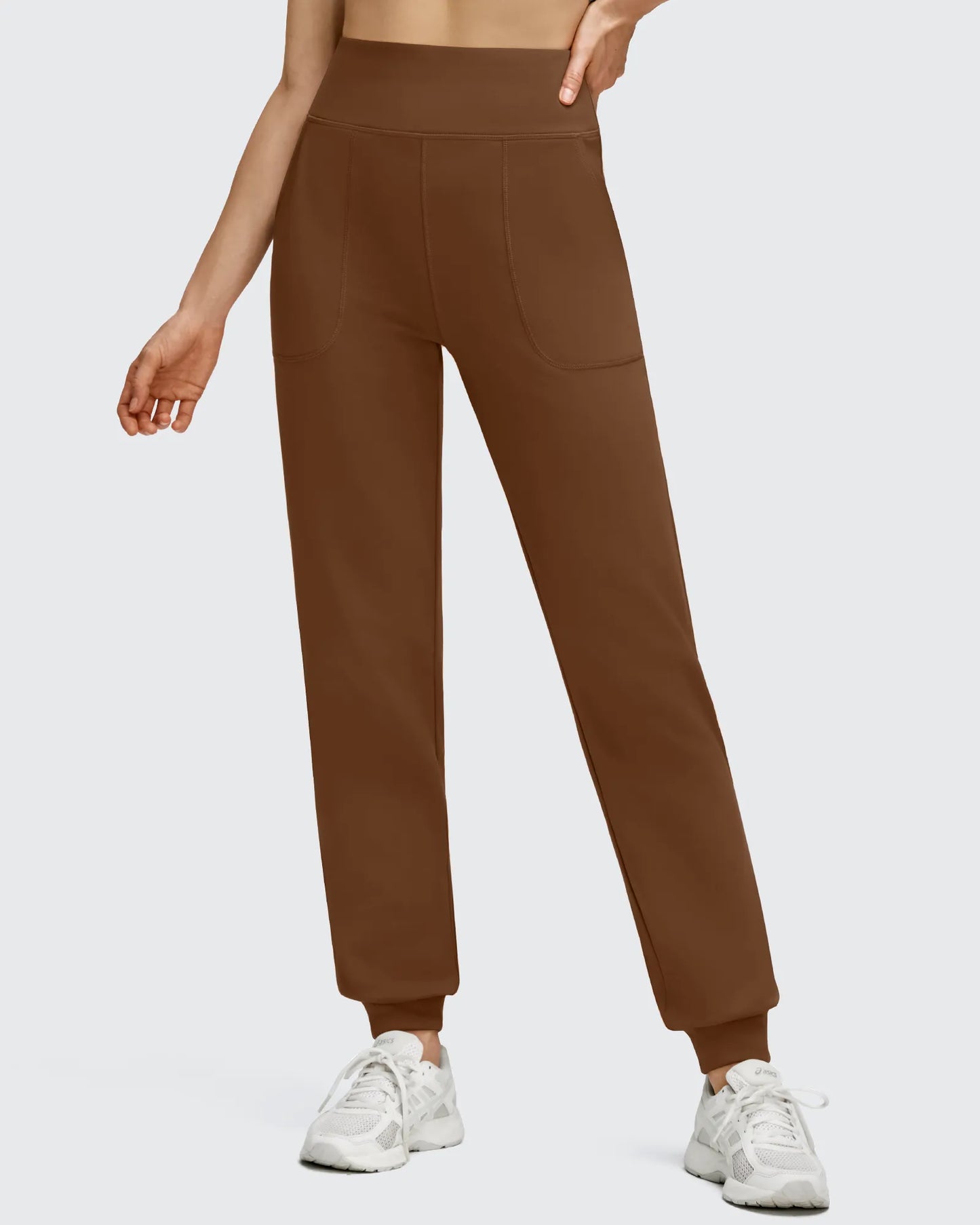 Pantalones deportivos de jogger con forro polar, puños elásticos y bolsillos