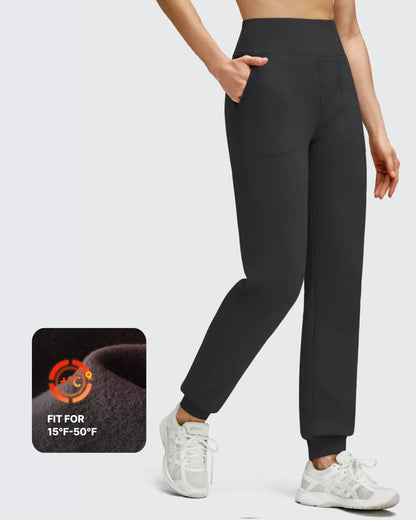 Pantalones deportivos de jogger con forro polar, puños elásticos y bolsillos