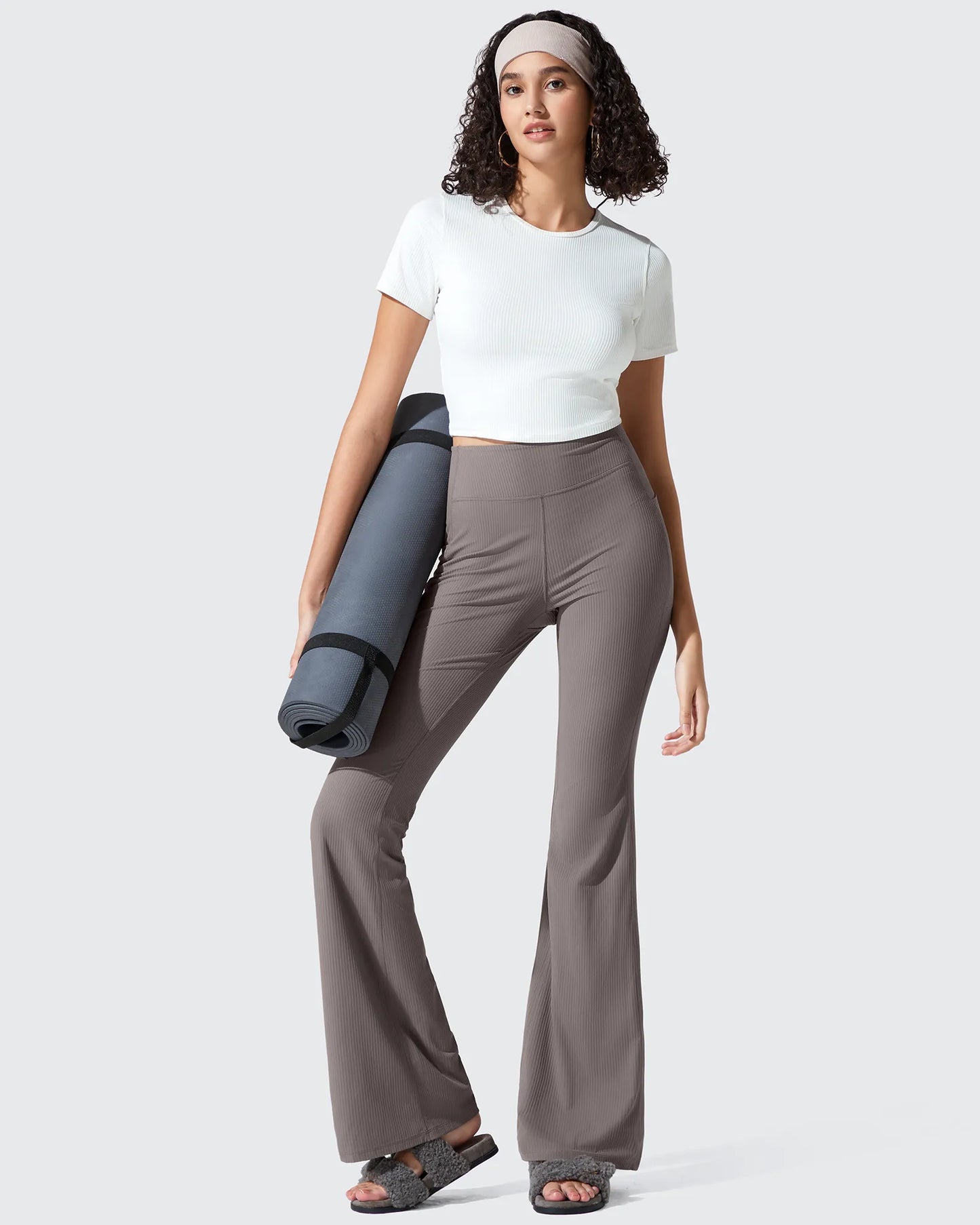 Leggings acanalados de tiro alto con bolsillos y corte de bota