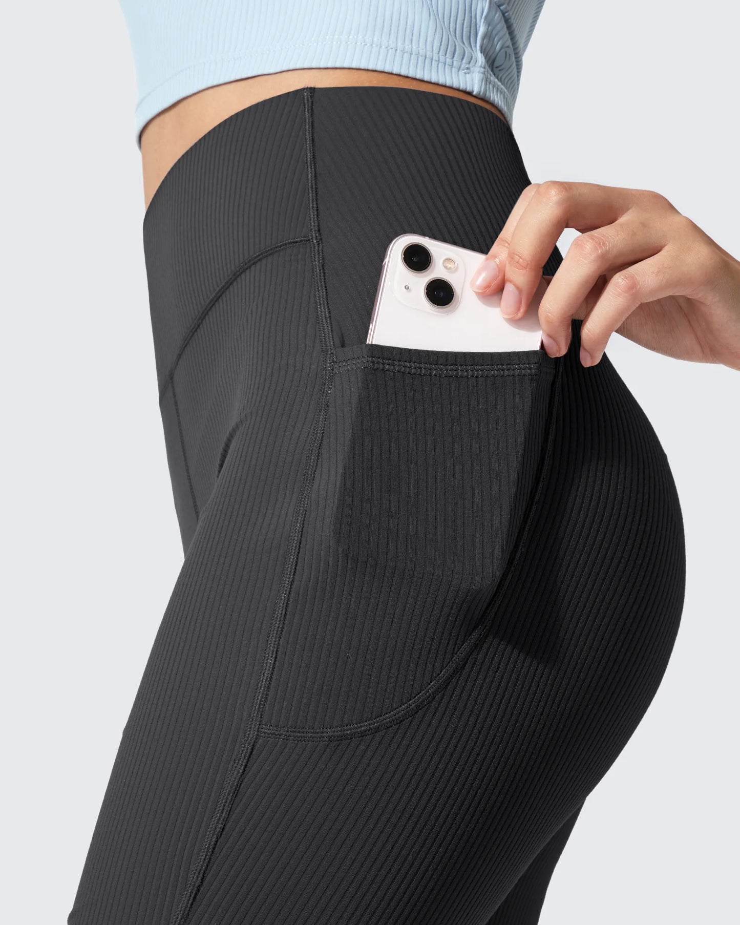 Leggings acanalados de tiro alto con bolsillos y corte de bota