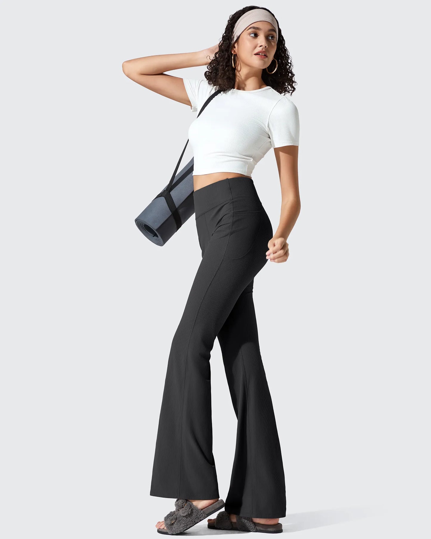 Leggings acanalados de tiro alto con bolsillos y corte de bota
