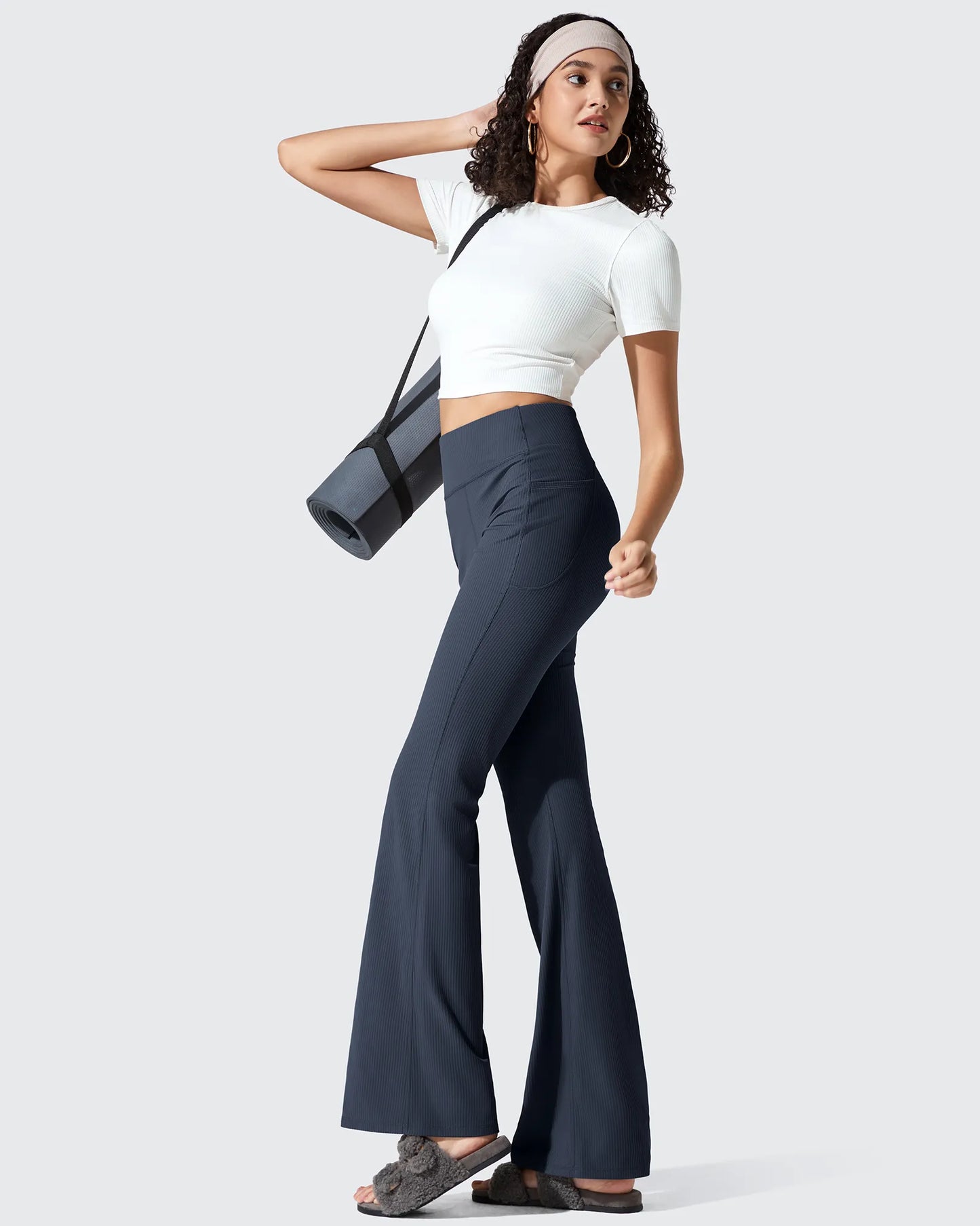 Leggings acanalados de tiro alto con bolsillos y corte de bota