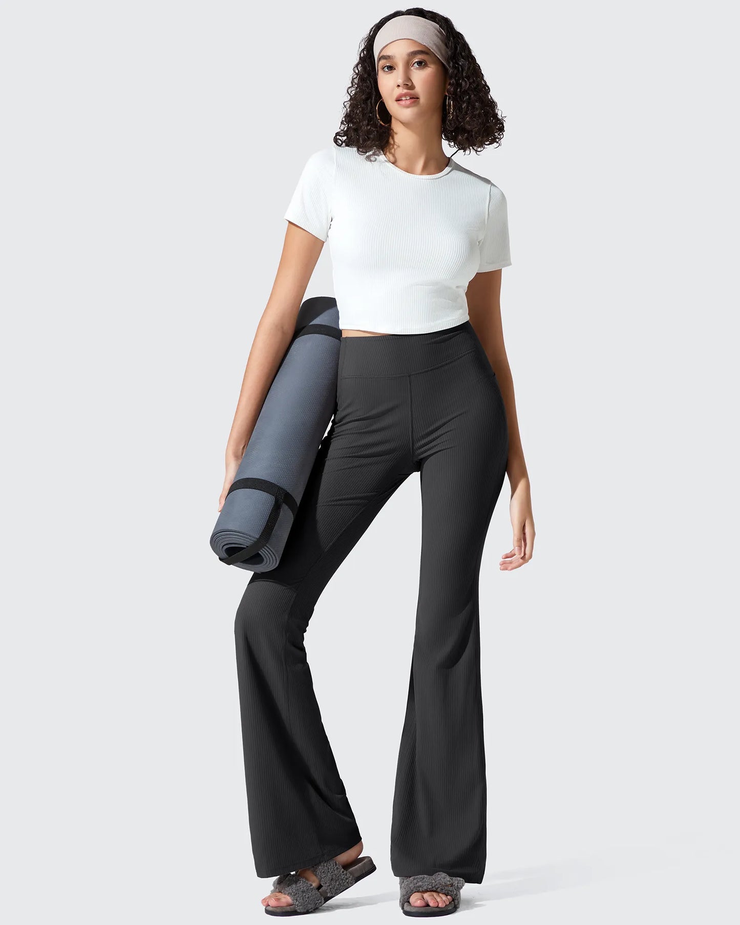 Leggings acanalados de tiro alto con bolsillos y corte de bota