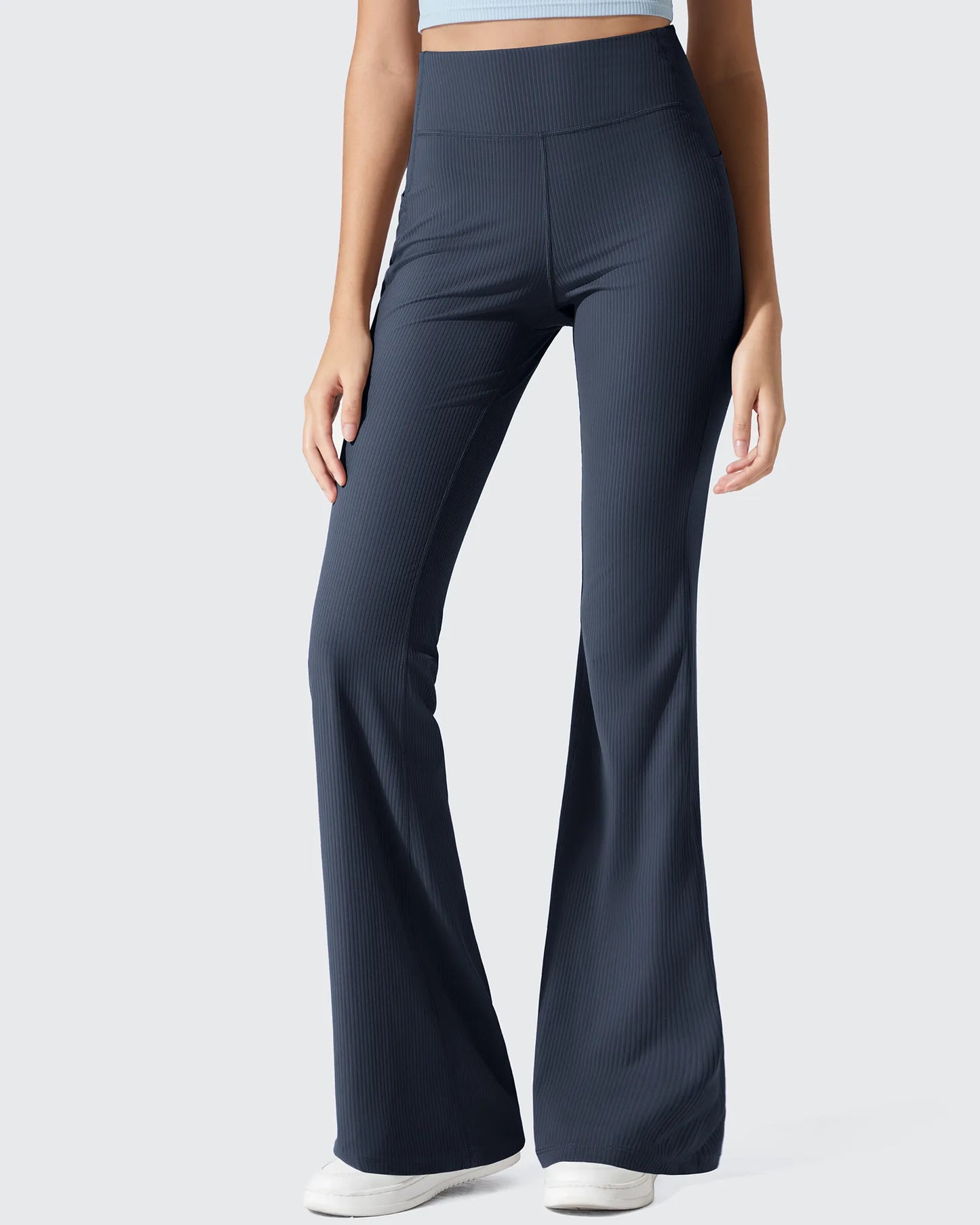 Leggings acanalados de tiro alto con bolsillos y corte de bota