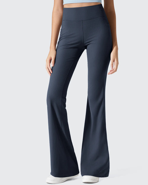 Leggings acanalados de tiro alto con bolsillos y corte de bota